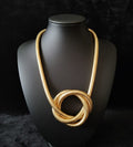 Versatile Golden Knot Jewelry – Bracelet & Necklace Combo