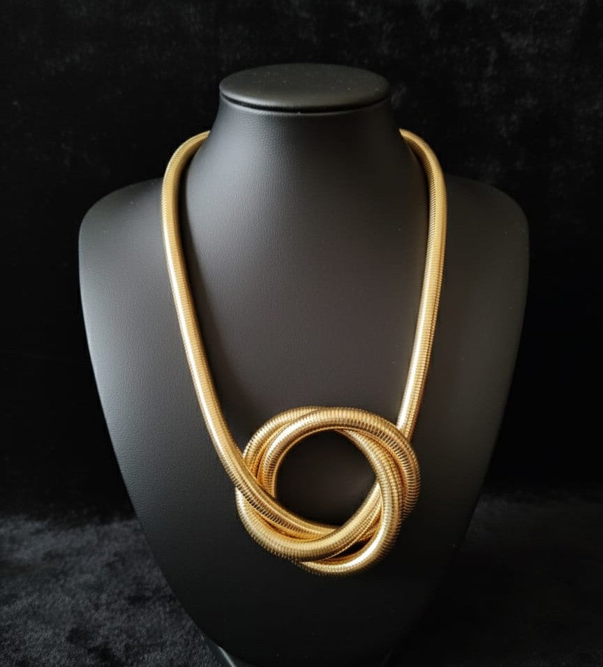 Versatile Golden Knot Jewelry – Bracelet & Necklace Combo